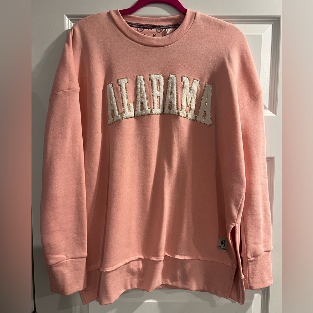 Pink Alabama Crimson Tide sweatshirt with gold lettering. Size medium
